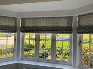 roman blinds in a bay window in Wellesbourne