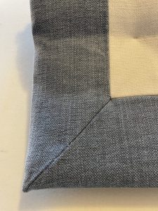 Handmade roman blind with mitred borders